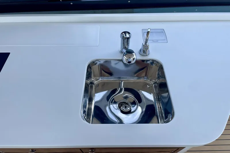  Yacht Photos Pics Stainless steel sink on 2024 MJM 4 yacht, featuring modern faucet and sleek design.