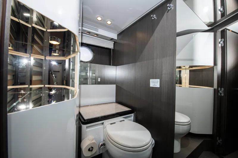 Another Chance III Yacht Photos Pics Luxurious bathroom interior of 2021 Azimut S7 yacht with modern fixtures and elegant design.