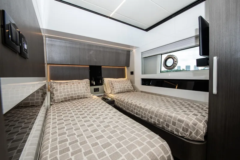 Another Chance III Yacht Photos Pics Luxurious twin cabin interior of 2021 Azimut S7 yacht with modern design and amenities.