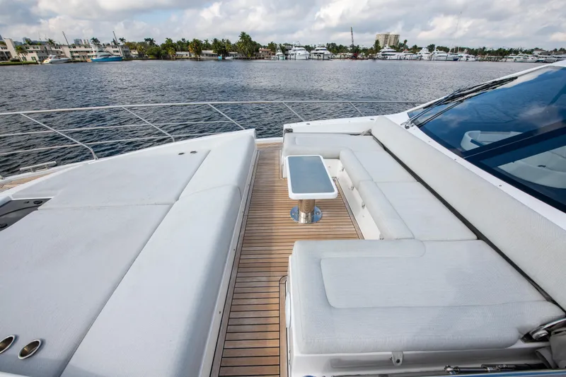 Another Chance III Yacht Photos Pics Luxurious 2021 Azimut S7 yacht deck with seating, overlooking serene waterfront.