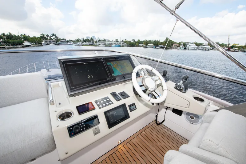 Another Chance III Yacht Photos Pics 2021 Azimut S7 yacht helm with modern navigation controls and waterfront view.