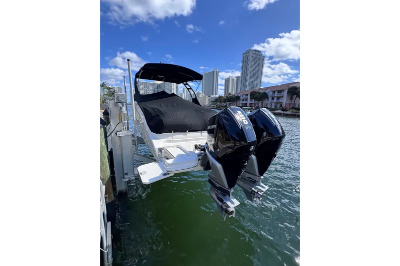  Yacht Photos Pics 2024 Sea Ray SDX 290 Outboard boat docked with twin Mercury engines.