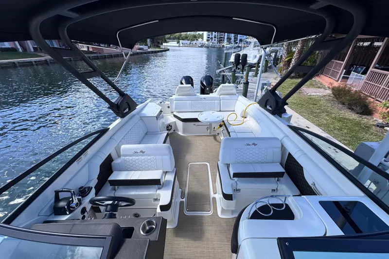  Yacht Photos Pics 2024 Sea Ray SDX 290 Outboard boat interior, featuring luxurious seating and modern design.