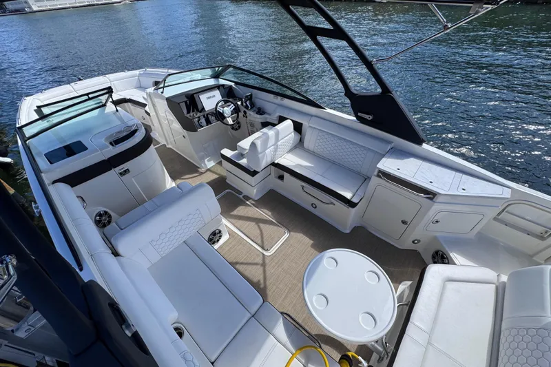  Yacht Photos Pics 2024 Sea Ray SDX 290 Outboard boat interior with luxurious seating and modern design.