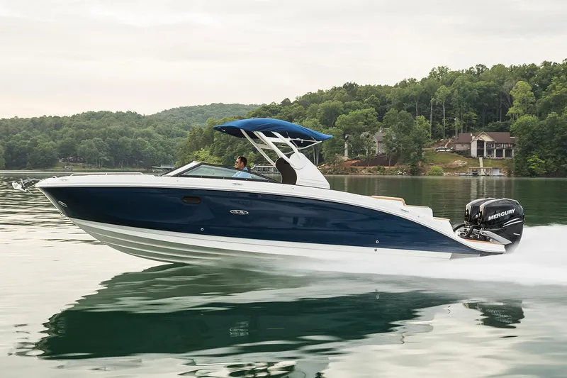  Yacht Photos Pics Manufacturer Provided Image: 2021 Sea Ray SDX 290 Outboard cruising on a lake with scenic background.