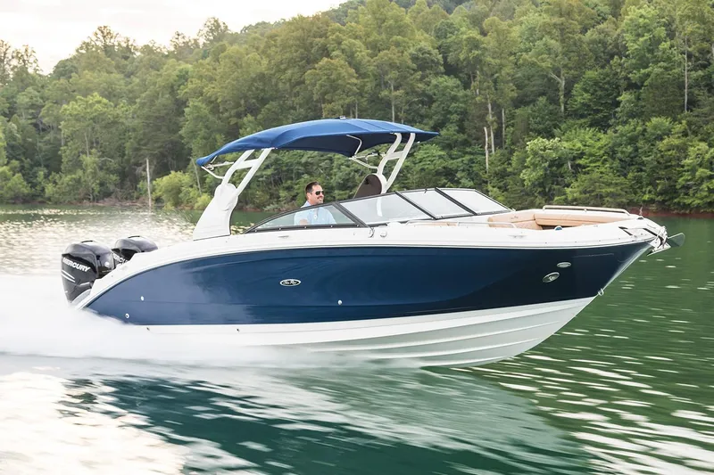  Yacht Photos Pics Manufacturer Provided Image: 2021 Sea Ray SDX 290 Outboard cruising on a lake with lush green forest background.