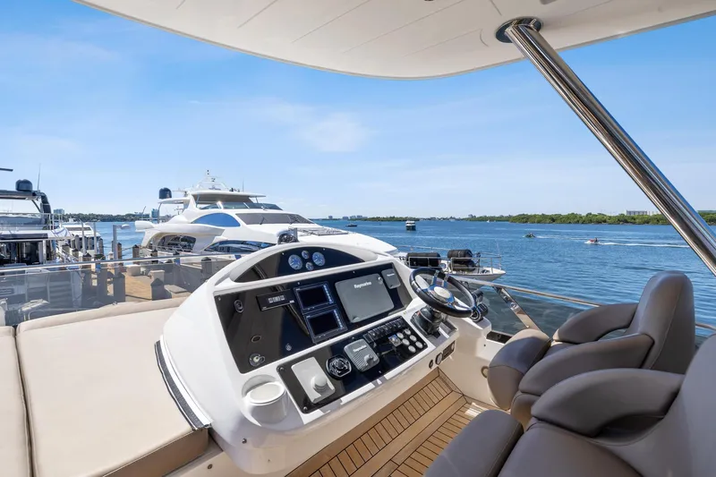  Yacht Photos Pics Flybridge of 2014 Sunseeker Manhattan 73 yacht with scenic ocean view.