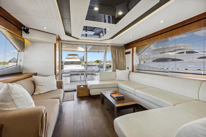  Yacht Photos Pics Luxurious interior of 2014 Sunseeker Manhattan 73 yacht with elegant seating and modern design.
