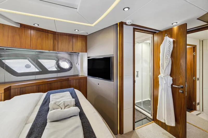  Yacht Photos Pics Luxurious cabin interior of 2014 Sunseeker Manhattan 73 yacht with modern amenities.