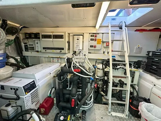  Yacht Photos Pics Engine room of 2014 Sunseeker Manhattan 73 yacht, featuring equipment and control panels.