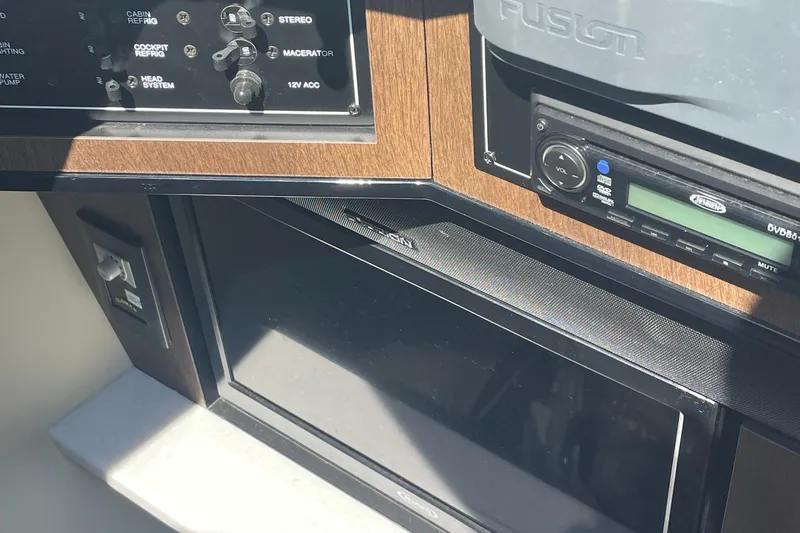  Yacht Photos Pics Control panel and stereo system in a 2018 Monterey 328 Super Sport boat.
