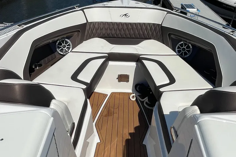  Yacht Photos Pics 2018 Monterey 328 Super Sport boat interior with luxurious seating and wood flooring.