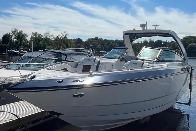  Yacht Photos Pics 2018 Monterey 328 Super Sport boat docked on a sunny day.