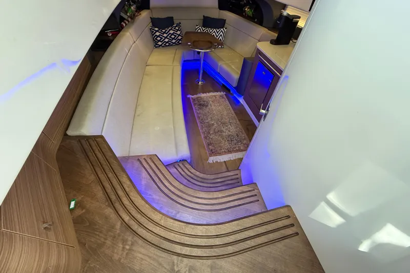  Yacht Photos Pics Luxurious interior of 2020 Boston Whaler 420 Outrage with elegant seating and ambient lighting.