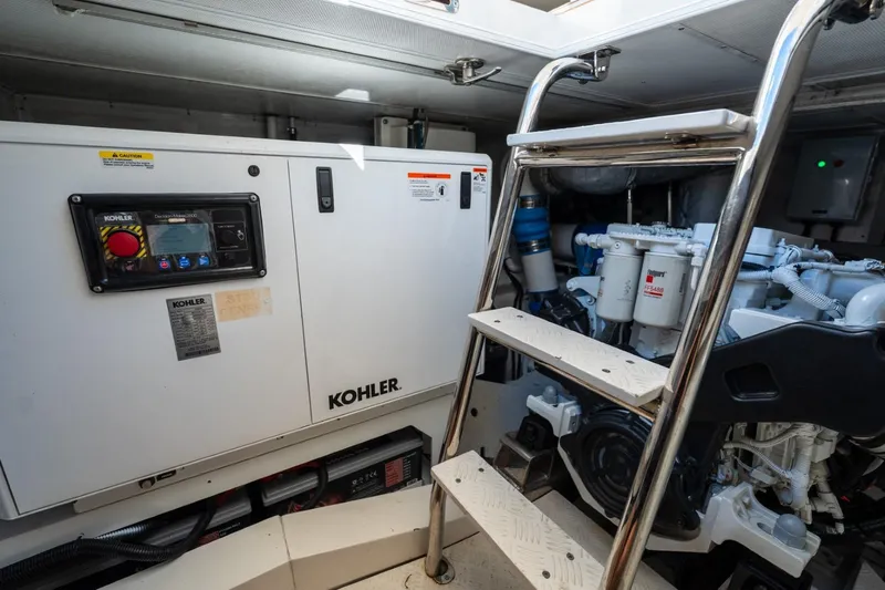 Bikini Bottom Yacht Photos Pics Engine room of 2023 Granocean 57 yacht with Kohler generator and ladder access.