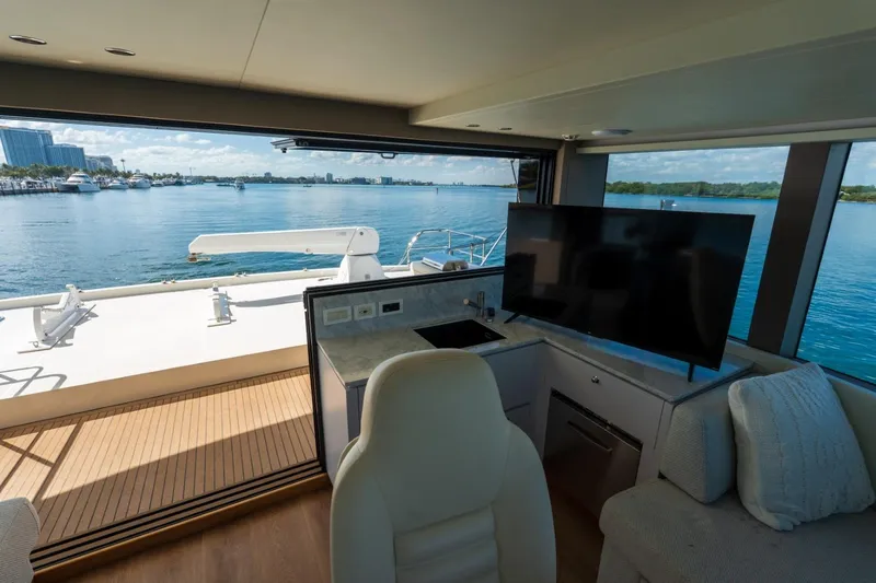 Bikini Bottom Yacht Photos Pics Interior view of 2023 Granocean 57 yacht with ocean backdrop and modern amenities.