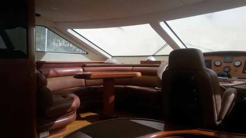  Yacht Photos Pics Interior of a 2004 Azimut 85 yacht with luxurious seating area.