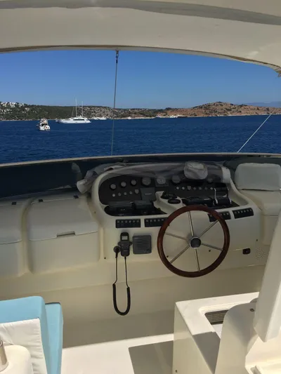  Yacht Photos Pics Cockpit of a 2004 Azimut 85 yacht on open sea.