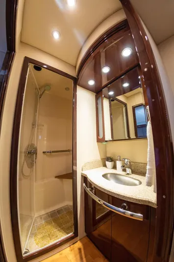  Yacht Photos Pics Luxurious bathroom in 2008 Sea Ray 60 Sundancer yacht with modern fixtures and elegant design.