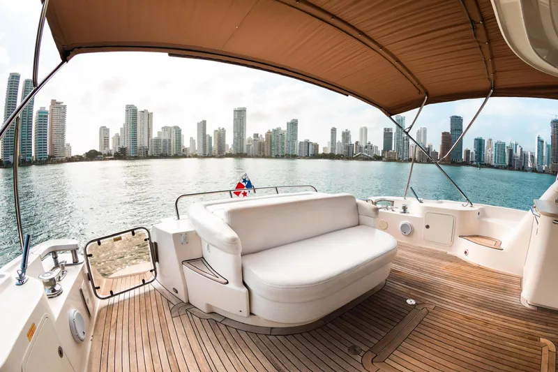  Yacht Photos Pics Luxurious 2008 Sea Ray 60 Sundancer yacht with city skyline view.