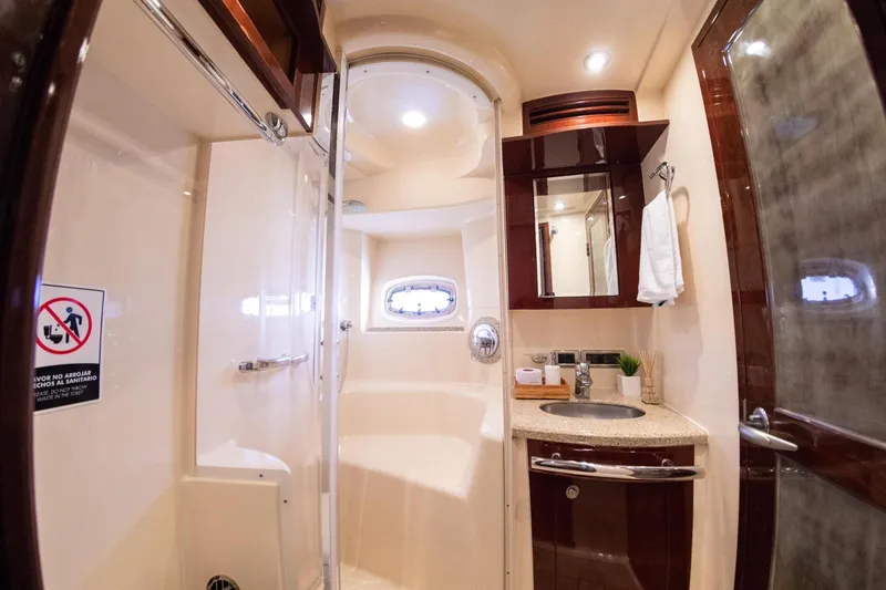  Yacht Photos Pics Luxurious bathroom interior of 2008 Sea Ray 60 Sundancer yacht, featuring modern amenities.