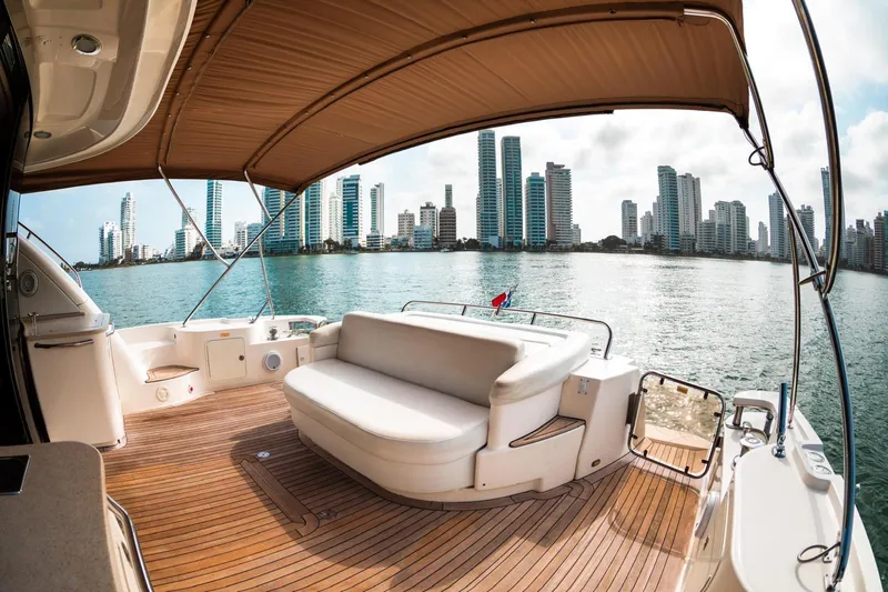  Yacht Photos Pics Luxurious 2008 Sea Ray 60 Sundancer yacht with city skyline view.