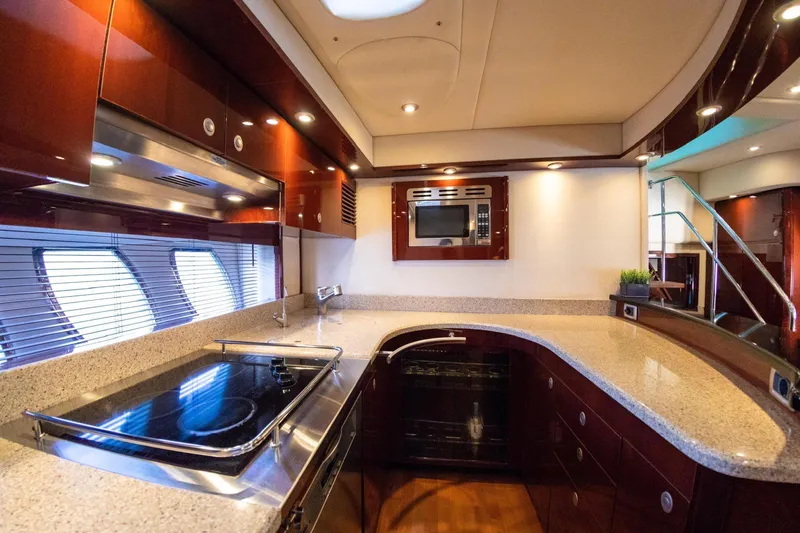  Yacht Photos Pics Luxurious kitchen interior of 2008 Sea Ray 60 Sundancer yacht with modern appliances.