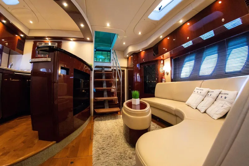  Yacht Photos Pics Luxurious interior of a 2008 Sea Ray 60 Sundancer yacht with elegant seating and modern design.