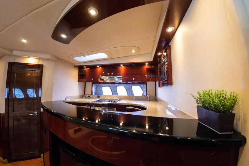  Yacht Photos Pics Luxurious interior of 2008 Sea Ray 60 Sundancer yacht kitchen with modern design.