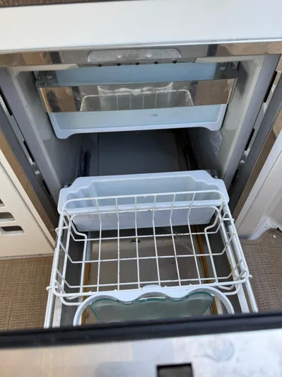 Sea Of O Yacht Photos Pics Open drawer on a 2015 Sea Ray 350 SLX boat, showcasing storage space.