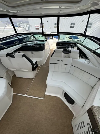 Sea Of O Yacht Photos Pics 2015 Sea Ray 350 SLX boat interior with white seating and modern dashboard.