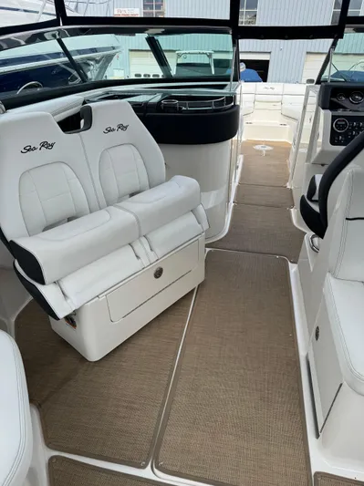Sea Of O Yacht Photos Pics 2015 Sea Ray 350 SLX boat interior with white seating and beige flooring.