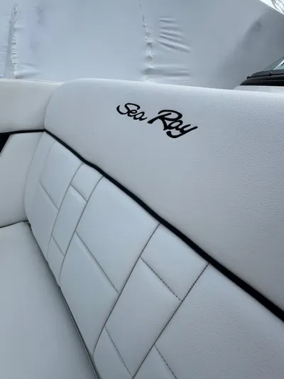 Sea Of O Yacht Photos Pics 2015 Sea Ray 350 SLX boat interior with white leather seating and logo.