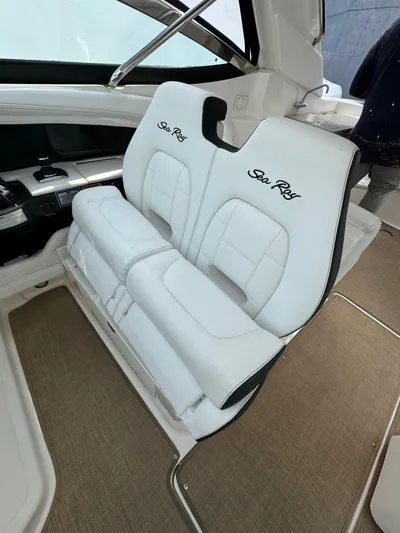 Sea Of O Yacht Photos Pics 2015 Sea Ray 350 SLX boat interior with white leather seating and embroidered logos.