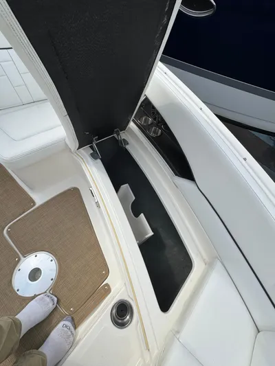 Sea Of O Yacht Photos Pics 2015 Sea Ray 350 SLX boat interior storage compartment with open hatch.