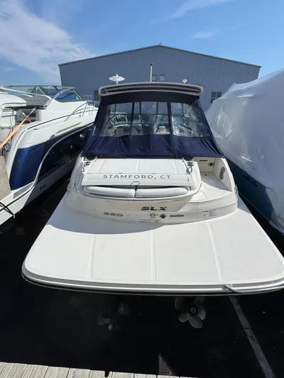 Sea Of O Yacht Photos Pics 2015 Sea Ray 350 SLX boat docked, featuring a spacious deck and sleek design.
