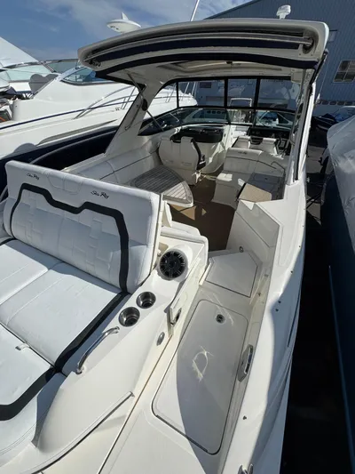 Sea Of O Yacht Photos Pics 2015 Sea Ray 350 SLX luxury boat interior with white seating and modern dashboard.