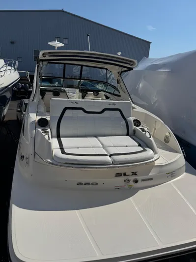 Sea Of O Yacht Photos Pics 2015 Sea Ray 350 SLX boat with spacious seating, docked outdoors.
