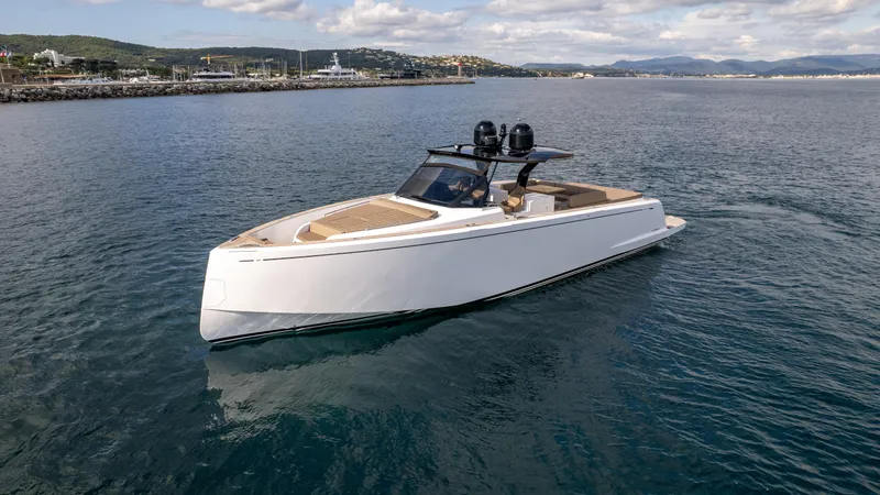  Yacht Photos Pics 2024 Pardo Yachts 50 cruising on calm waters under a partly cloudy sky.