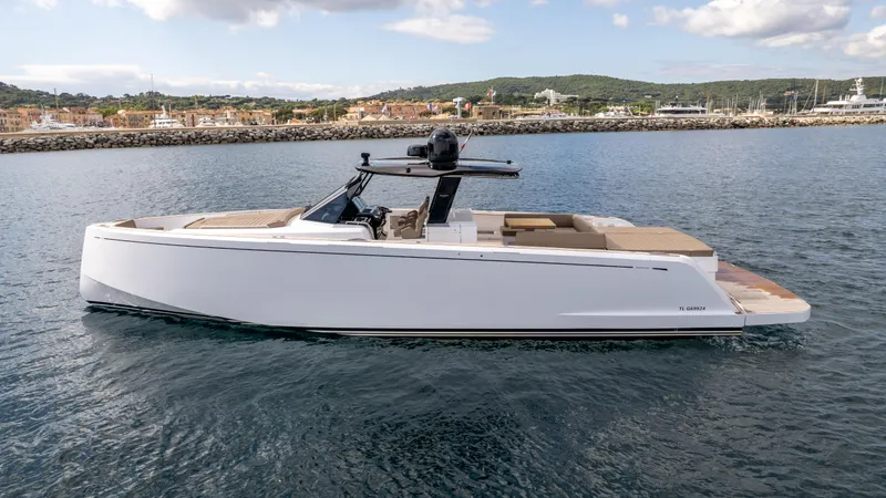  Yacht Photos Pics 2024 Pardo Yachts 50 cruising on calm waters under a partly cloudy sky.