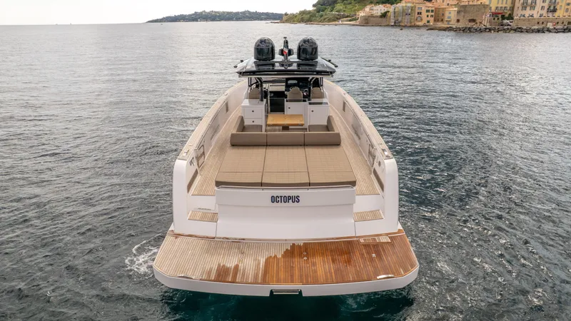  Yacht Photos Pics 2024 Pardo Yachts 50 on water, rear view with spacious deck and twin engines.