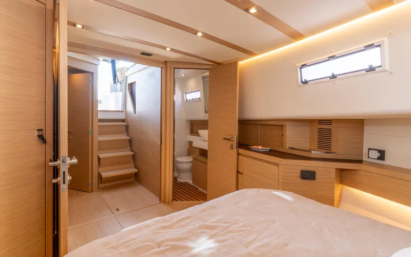  Yacht Photos Pics Luxurious interior of 2024 Pardo Yachts 50, featuring modern wood finishes and elegant design.