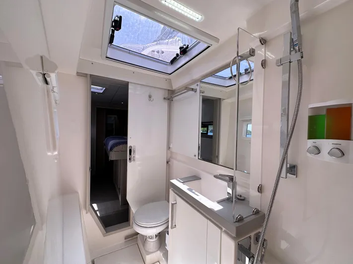  Yacht Photos Pics Modern bathroom in a 2019 Leopard 58 yacht.