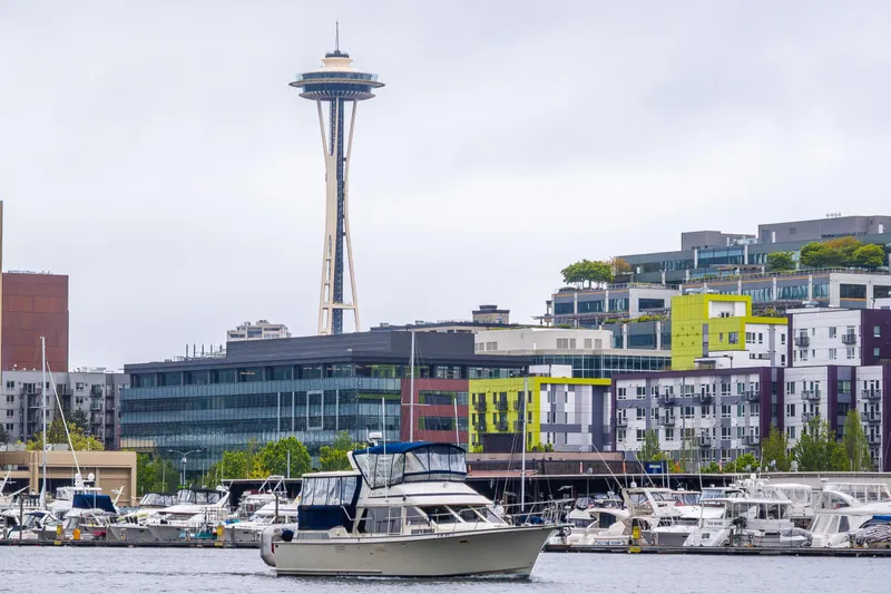 Blue Fish Yacht Photos Pics 1988 Tollycraft 44CPMY yacht in Seattle marina with Space Needle in background.