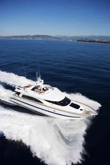  Yacht Photos Pics Luxury yacht Horizon Elegance 80 cruising on open sea, 2000 model.