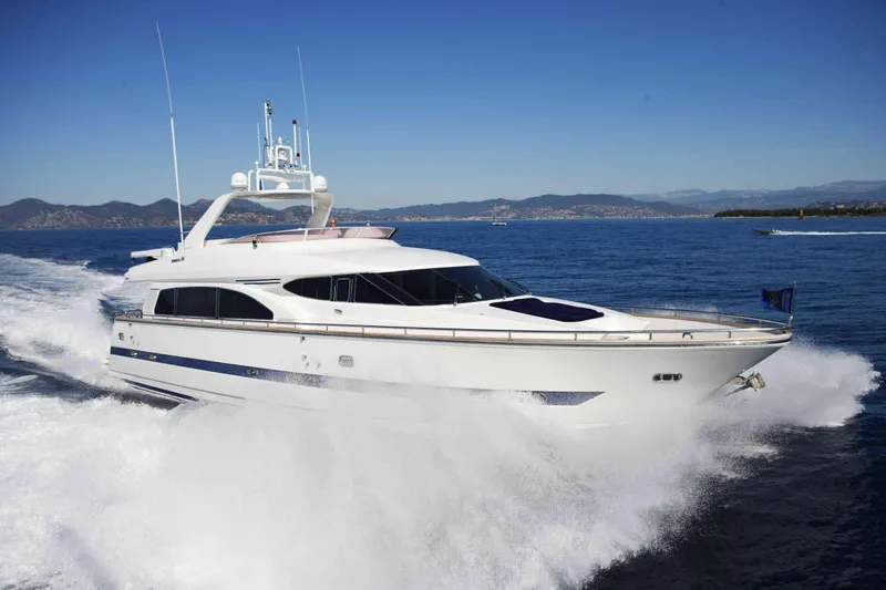  Yacht Photos Pics Luxury yacht Horizon Elegance 80 cruising on open sea, 2000 model.