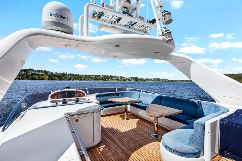  Yacht Photos Pics Luxurious Horizon Elegance 80 yacht deck with seating, wooden flooring, and scenic water view.