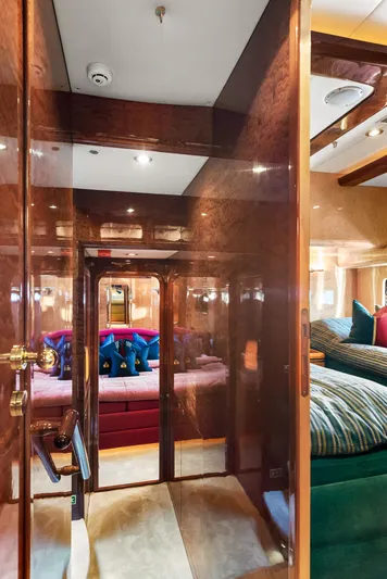  Yacht Photos Pics Luxurious interior of 2000 Horizon Elegance 80 yacht with polished wood and plush seating.