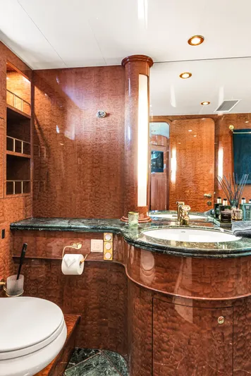  Yacht Photos Pics Luxurious yacht bathroom with elegant wood finish and modern fixtures, Horizon Elegance 80, 2000.