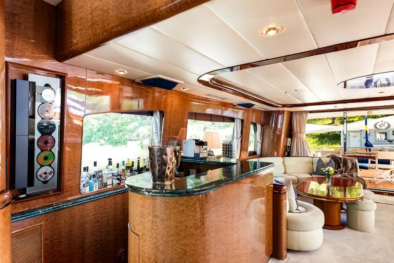  Yacht Photos Pics Luxurious interior of 2000 Horizon Elegance 80 yacht with bar and seating area.